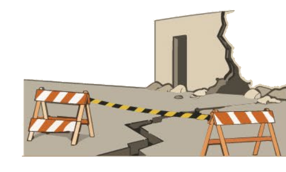 Muro agrietado con vallas de seguridad
